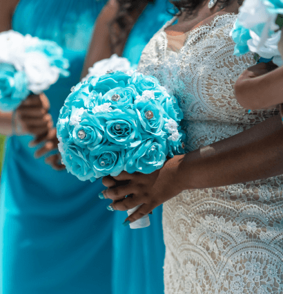 image of bride with flower in hand